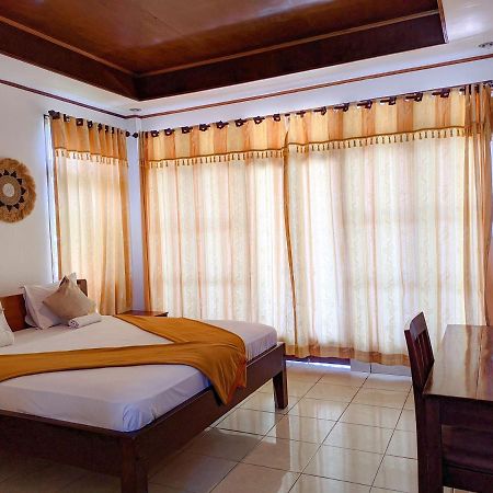 Anda Beach Hotel Bira Extérieur photo