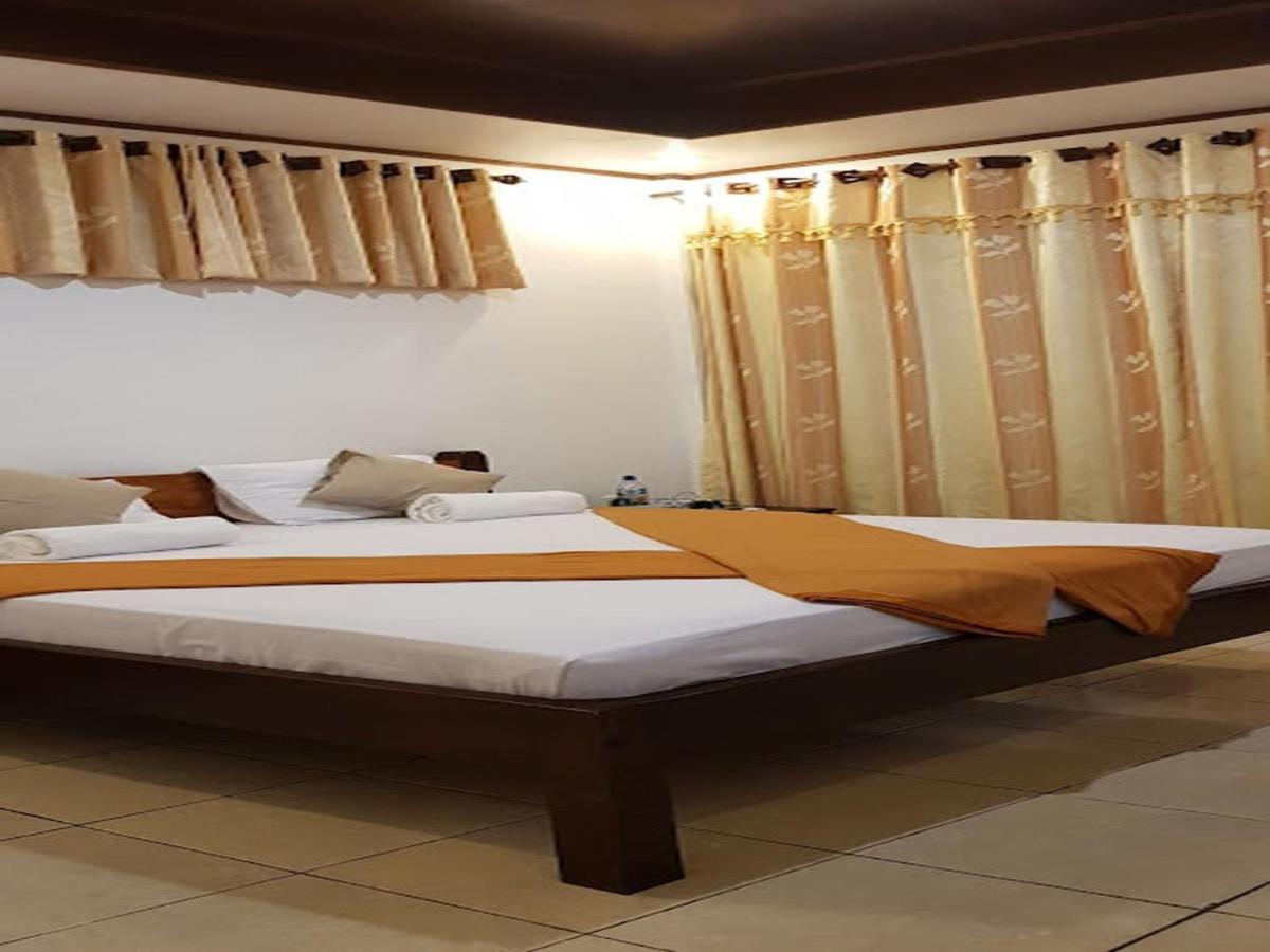 Anda Beach Hotel Bira Extérieur photo