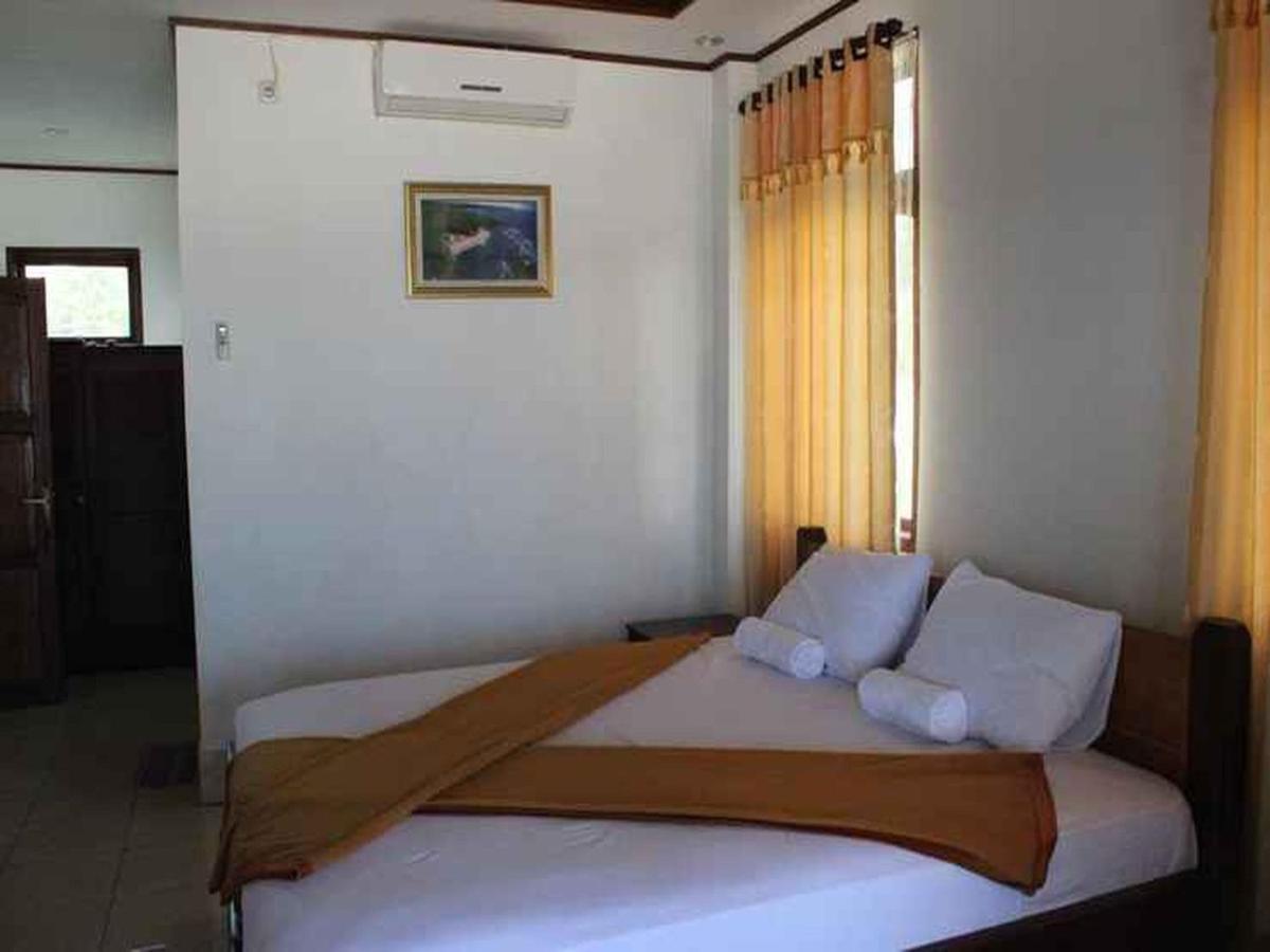 Anda Beach Hotel Bira Extérieur photo